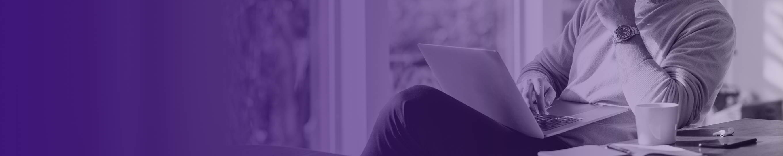 Header banner man on laptop